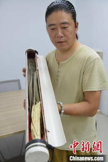 草編用的材料玉米皮、棕樹葉 李鵬茹 攝