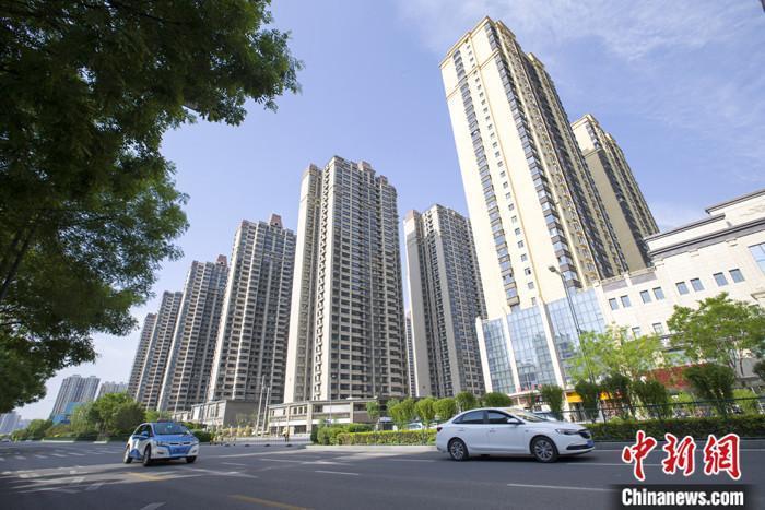 資料圖：車輛從一樓盤前經(jīng)過。 <a target='_blank' href='/'><p  align=